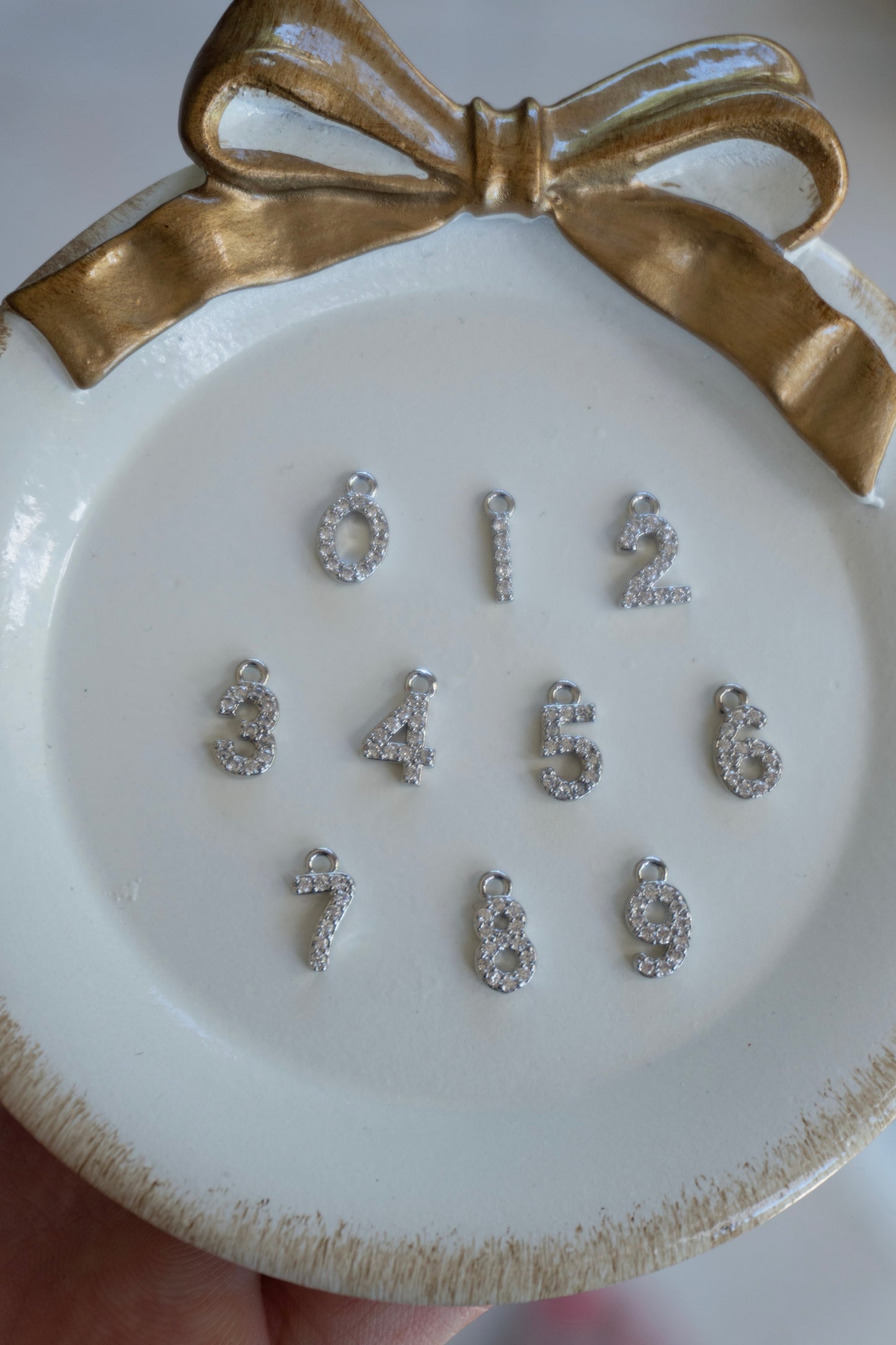 number (gold + silver) charm