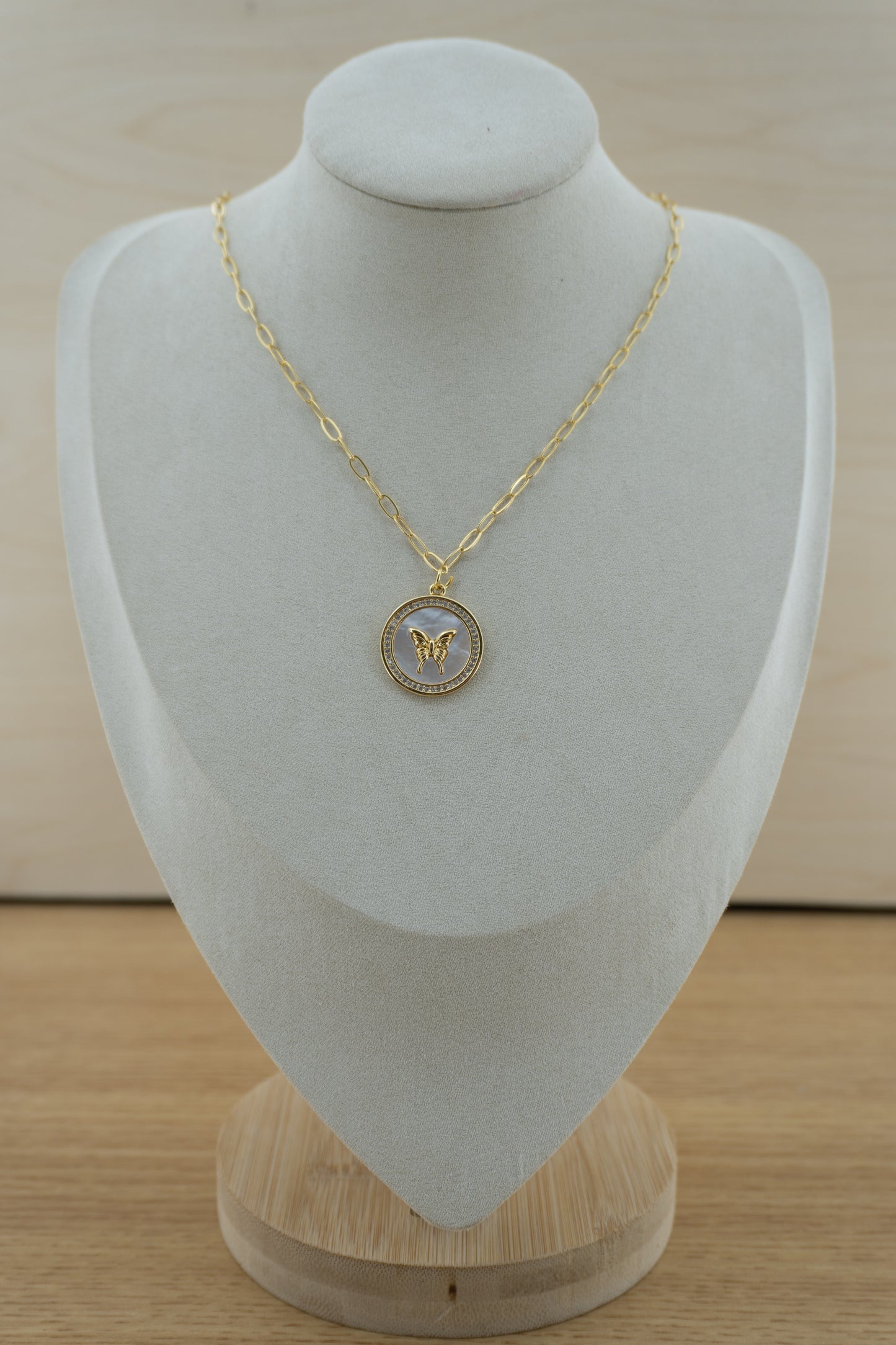 butterfly mother of pearl circle charm
