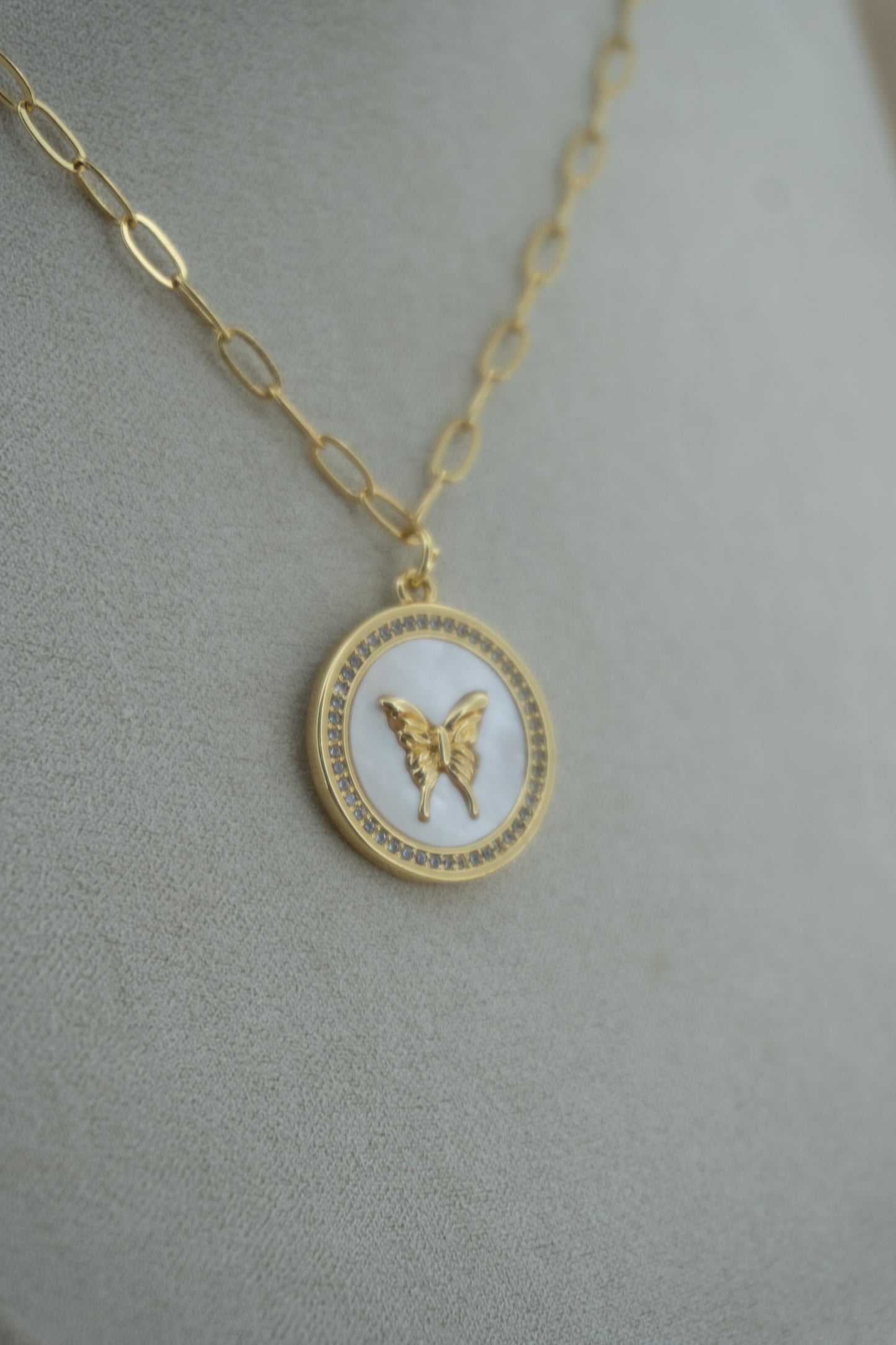 butterfly mother of pearl circle charm