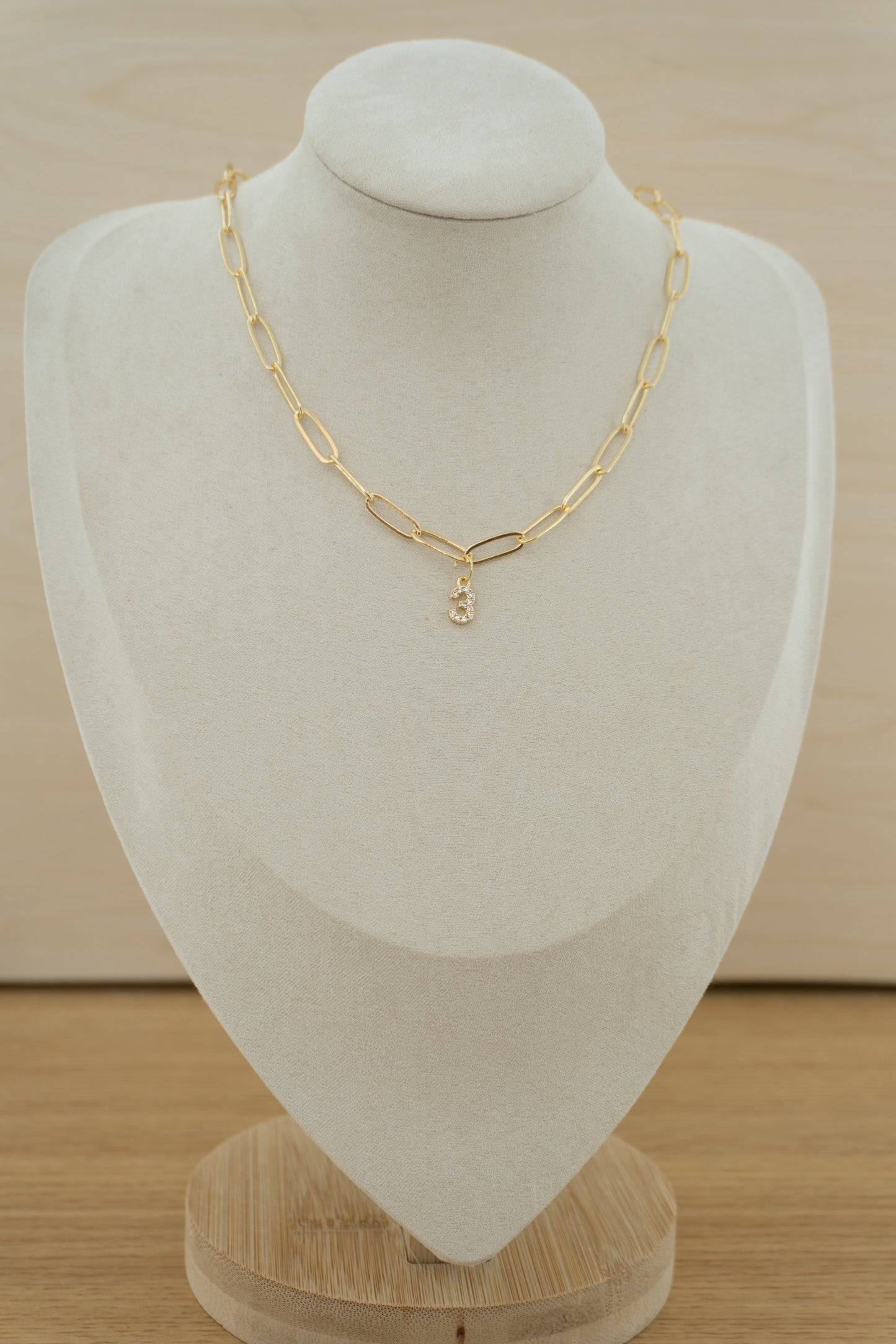 number (gold + silver) charm