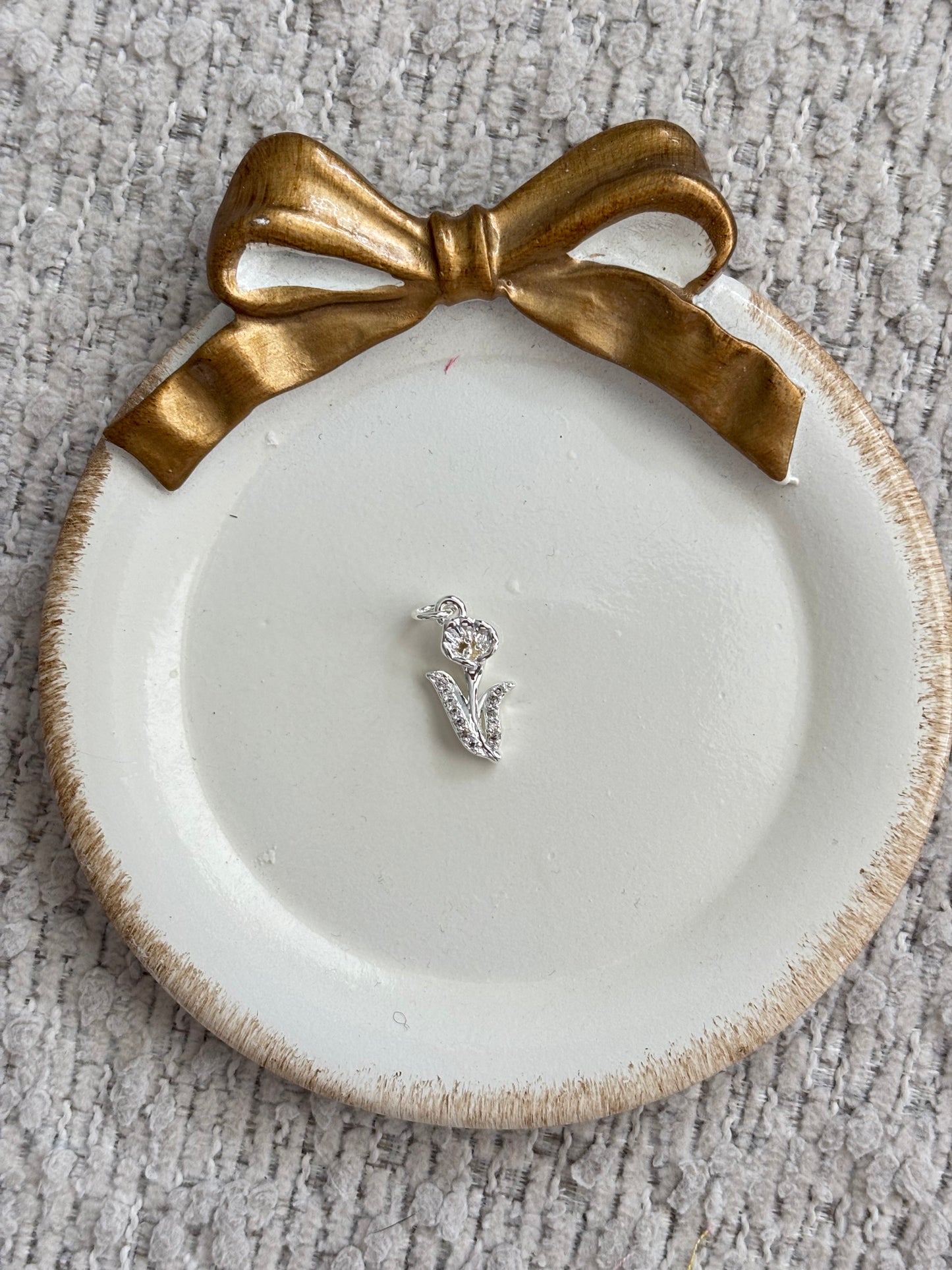 sprouting flower charm in silver