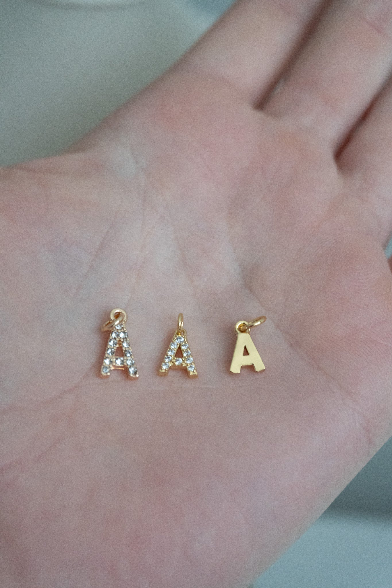letter sparkle charm in gold