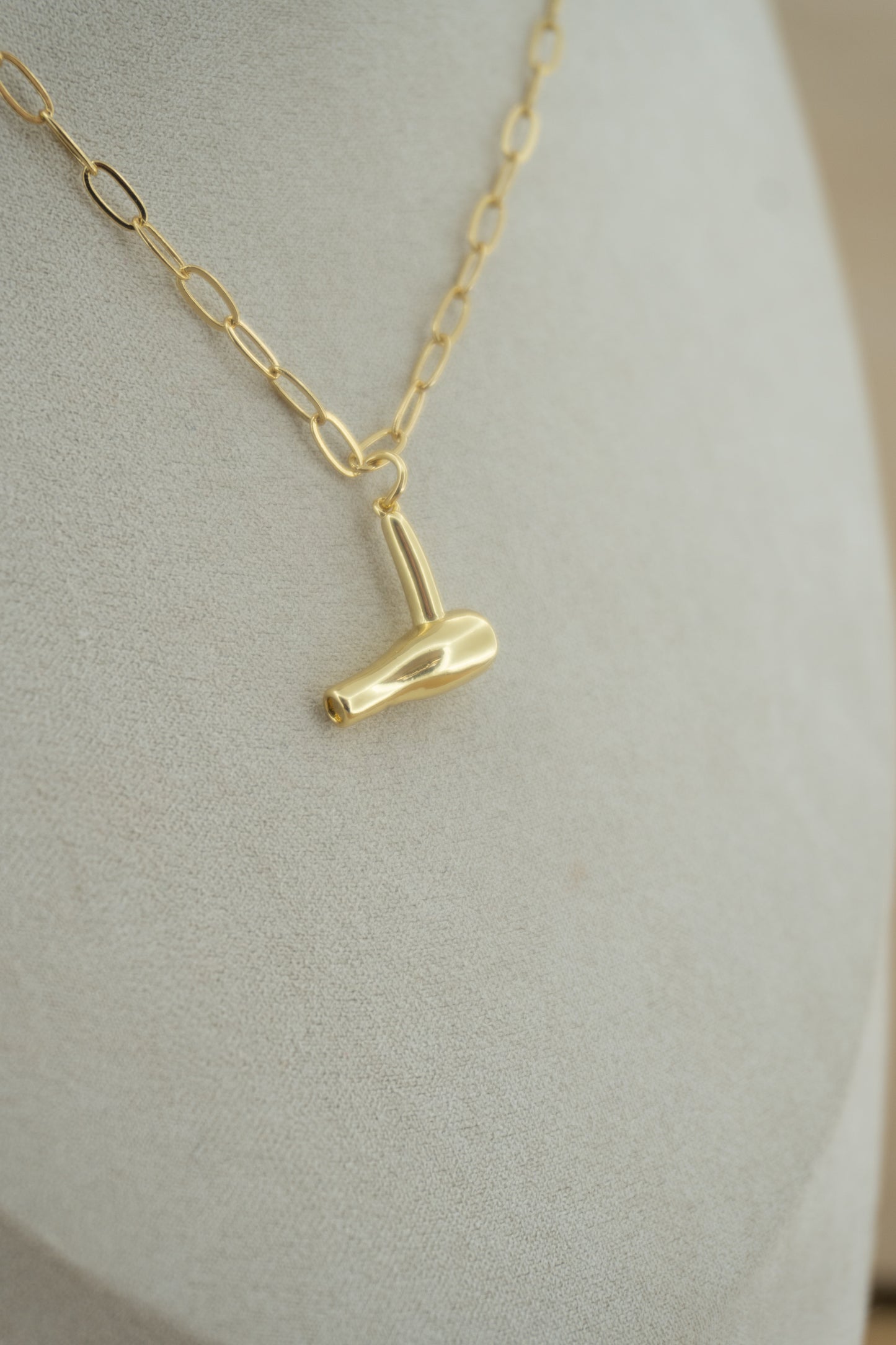 blow dryer gold charm