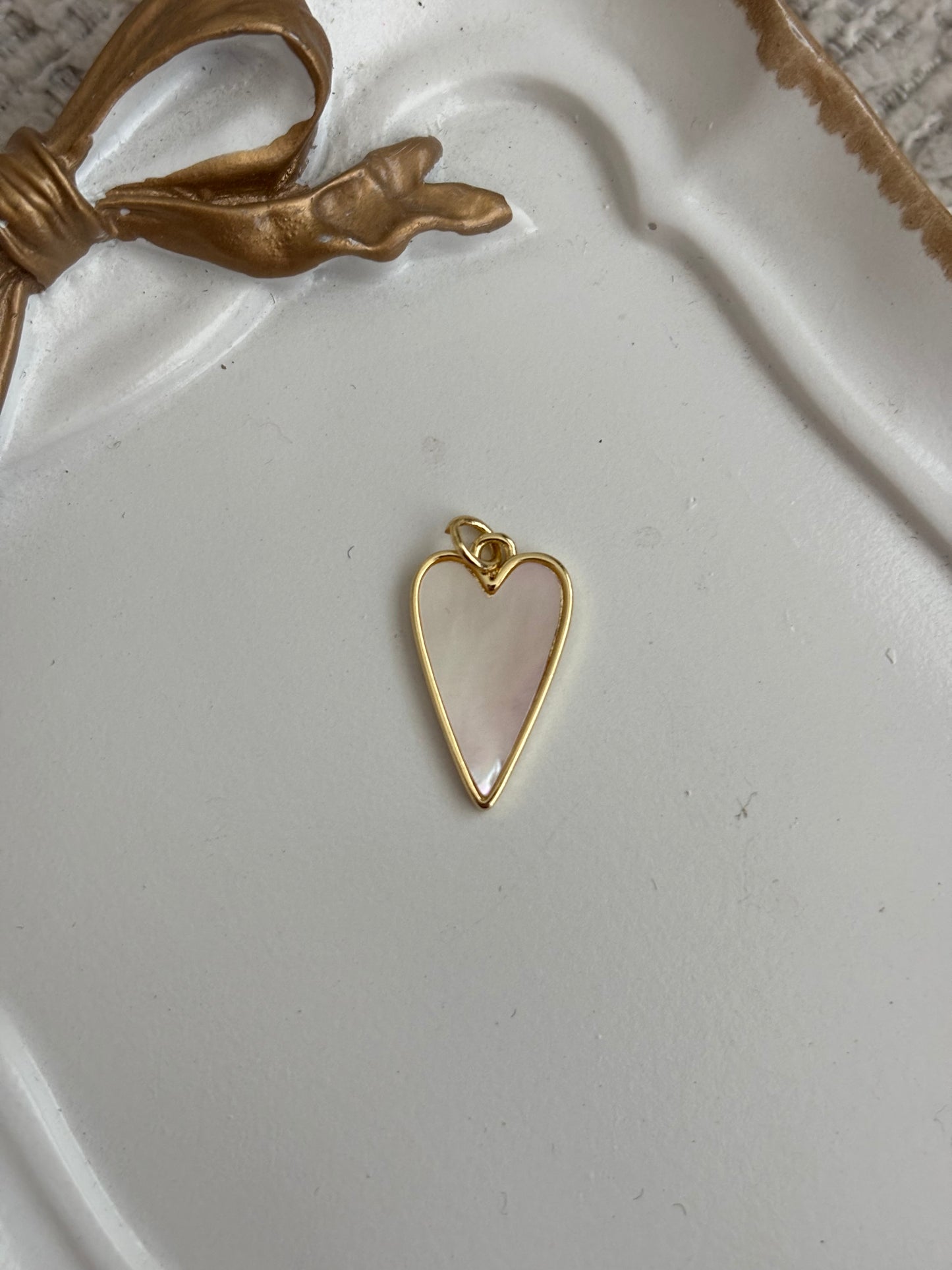 mother of pearl oblong heart charm