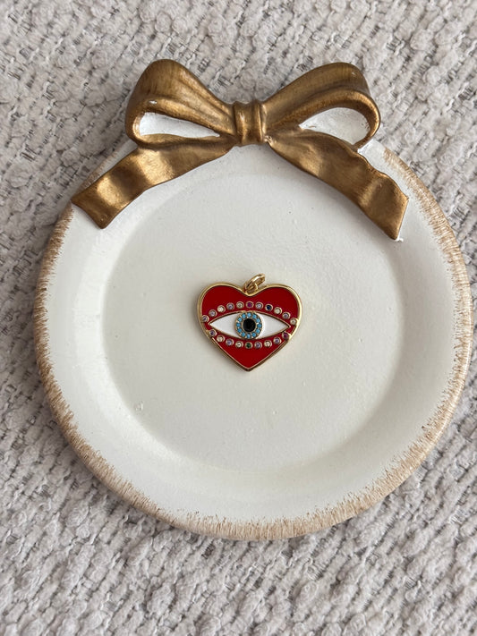 red evil eye charm