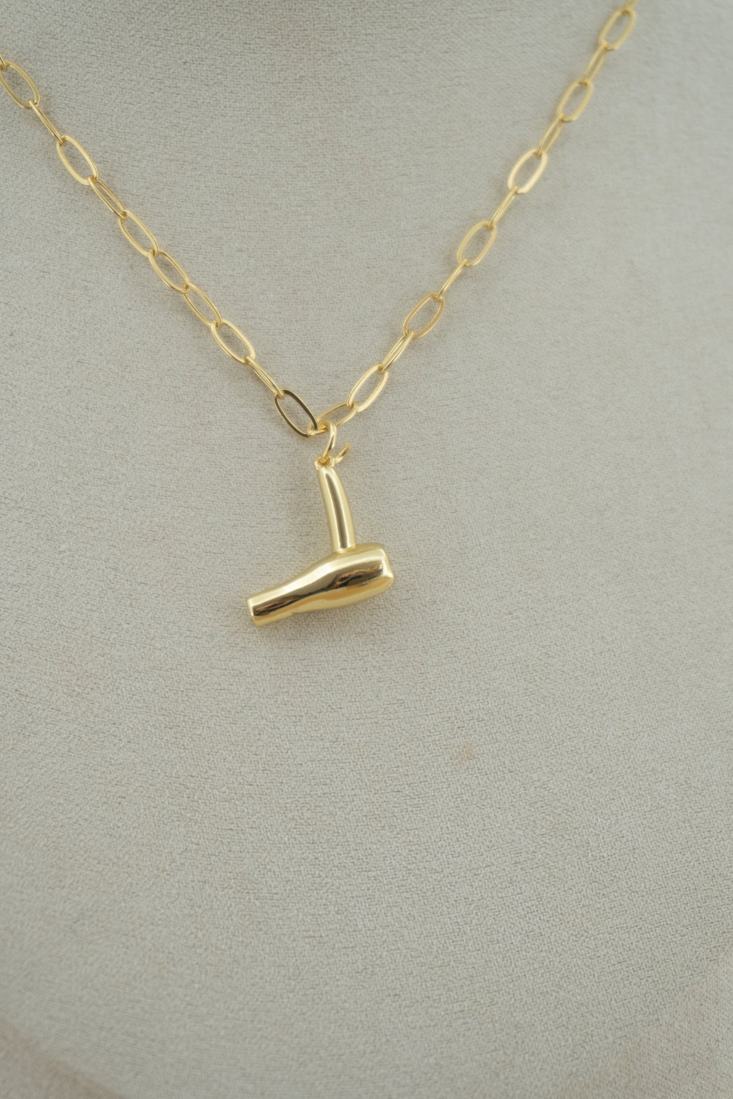 blow dryer gold charm