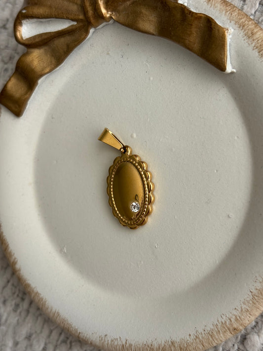 scallop medallion charm