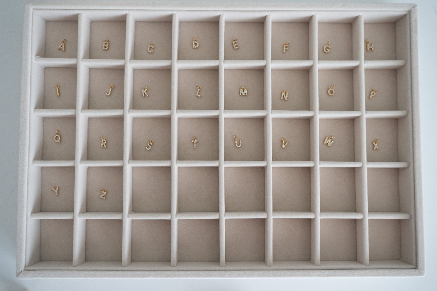 letter sparkle charm in gold