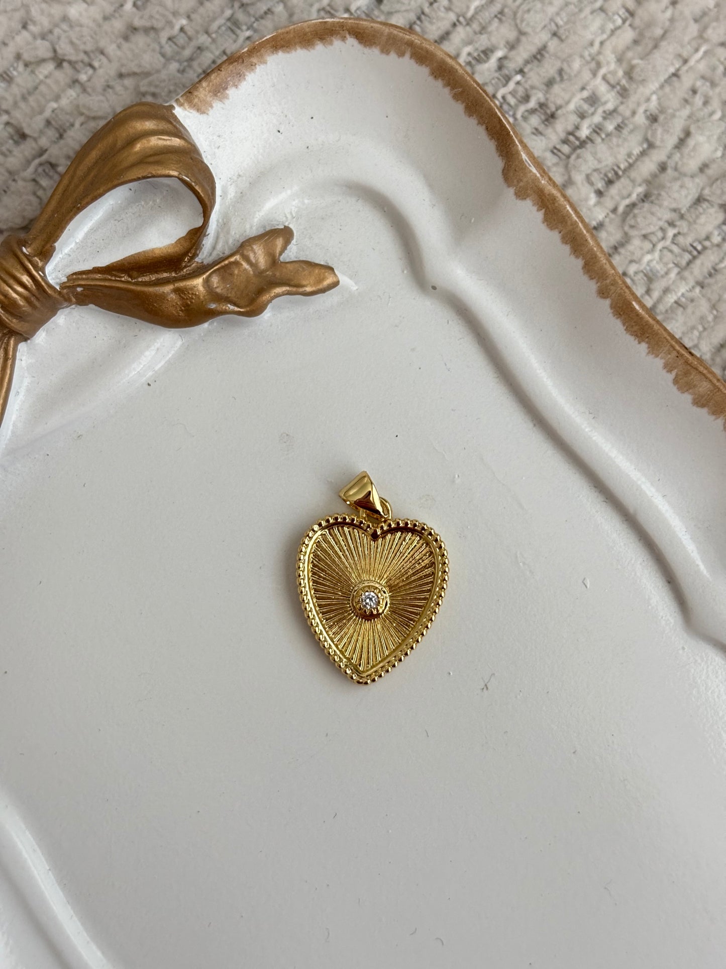 radiant heart charm